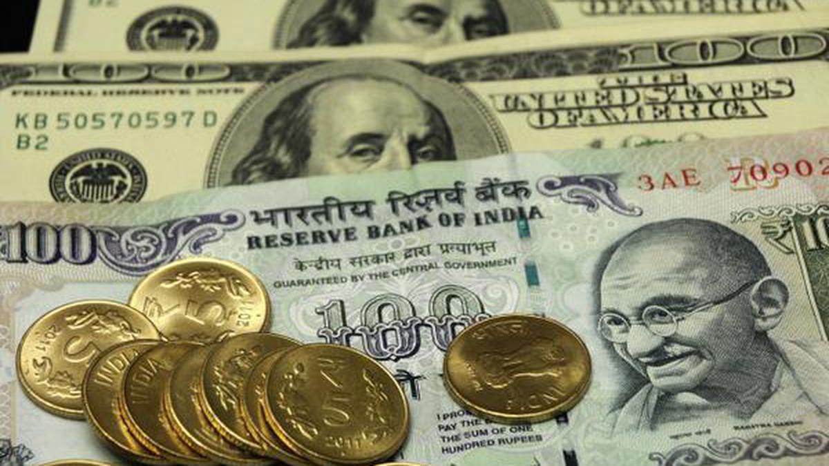 Rupee falls eight paise to 82.12 against US dollar