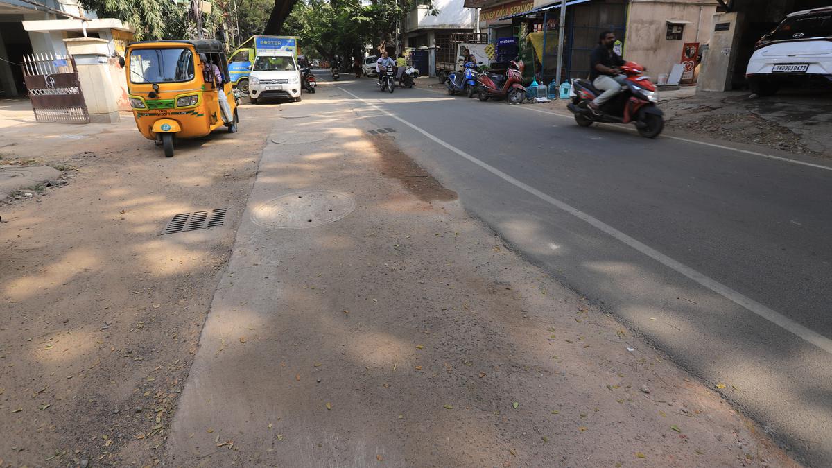 In Kodambakkam, a parking lot in the middle of the road